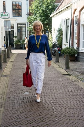 White Trousers With A Blue Silk Top 23